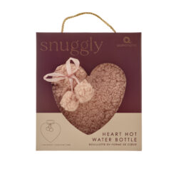 A snuggly pink heart shaped hot water bottle with two pom poms tied with a pink ribbon.