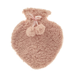 A pink heart shaped hot water bottle. Two pom poms are tied with a pink ribbon around the next of the bottle.