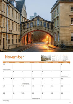 Example of inside pages, this page is November, with an image the Bridge of Sighs in Oxford at dusk with glowing streetlights and cobblestone street on the top page with the months calendar on the bottom page.