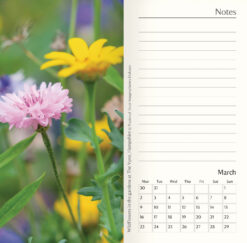 Example of an inside page featuring an image of flowers on the left page and a notes section on the right with a calendar of the month at the bottom.