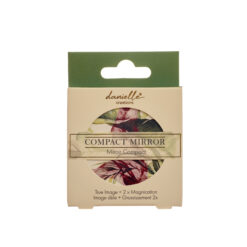 A compact mirror from Danielle Creations with floral pattern.