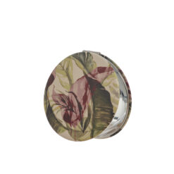 A circular compact mirror with a green floral design.