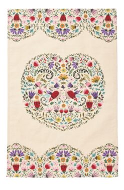 Beige tea towel with scalloped floral border at the top and bottom and a large heart in the centre. Birds and flowers fill the heart shape.