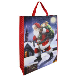 Large Christmas gift bag with an image of Santa carrying a sack of presents as he walks across snowy rooftops.