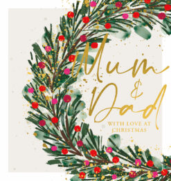 hristmas card with a pine wreath decorated with red and pink berries and gold accents, set against a light beige speckled background. Features the message “Mum & Dad With Love at Christmas” in elegant script.