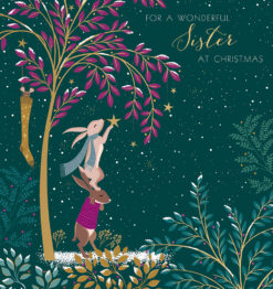 Christmas card for a sister featuring two rabbits in winter clothing placing a golden star on a magical tree, set in a snowy night time scene with pink and purple leaves and golden accents