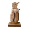 A wooden penguin wearing a cosy winter jumper, with a star charm around it's neck.