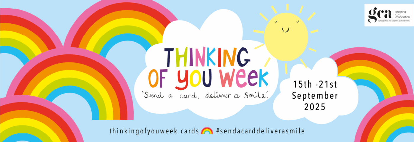A pale blue banner with colourful rainbows, clouds and a yellow sun. Text reads 'Thinking of you week. Send a card, deliver a smile'.