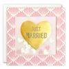 Square card with pink art deco style border. A gold heart in the centre has the text 'Just Married' and there is a square window behind which contains paper confetti hearts.