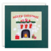 Square card with green border and translucent centre through which you can see paper confetti stars. THe illustration on the card features three stockings hung from the mantelpiece above a roaring fire. gifts sit either side of the fireplace and text above reads 'Merry Christmas'.