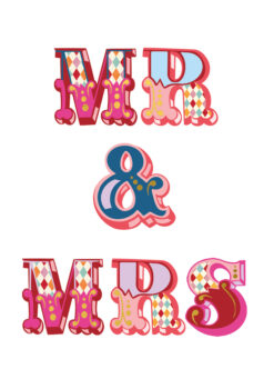 A white card with large, bold, colourful text reading 'Mr & Mrs'.