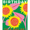 Birthday card featuring a bright, colourful illustration of sunflowers against a green background. Large text reads 'Happy Birthday to a Ray of Sunshine'.