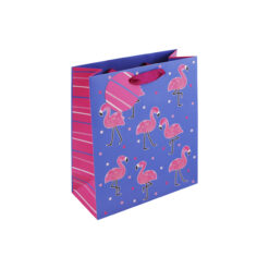 A blue gift bag decorated with pink flamingos, colourful polka dots, striped side panels, and purple ribbon handles.
