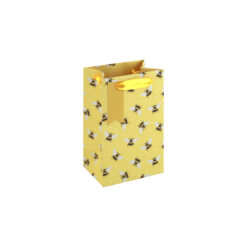 A small yellow gift bag with a repeating bee pattern and yellow ribbon handles.