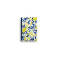 A6 notebook with white cover illustrated with yellow lemons and blue leaves. The book has a blue spine.