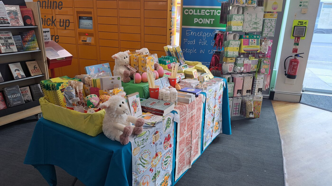 A table displaying Easter gifts, decorations and gift wrap alongside a card spinner.