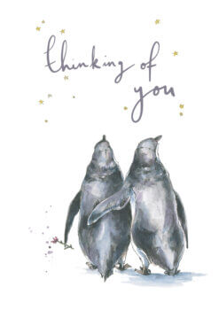 Watercolour illustration of two penguins walking side by side, one holding a small flower, with handwritten text ‘Thinking of you’ surrounded by tiny gold stars