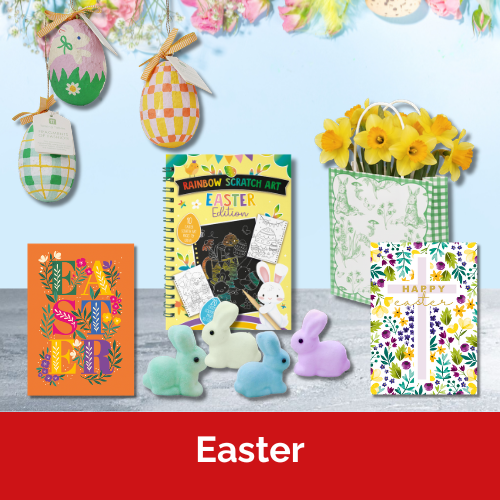 Easter cards, Easter crafts and Easter decorations on a table against a pastel blue background. There is a green paper rabbit bag filled with daffodils.